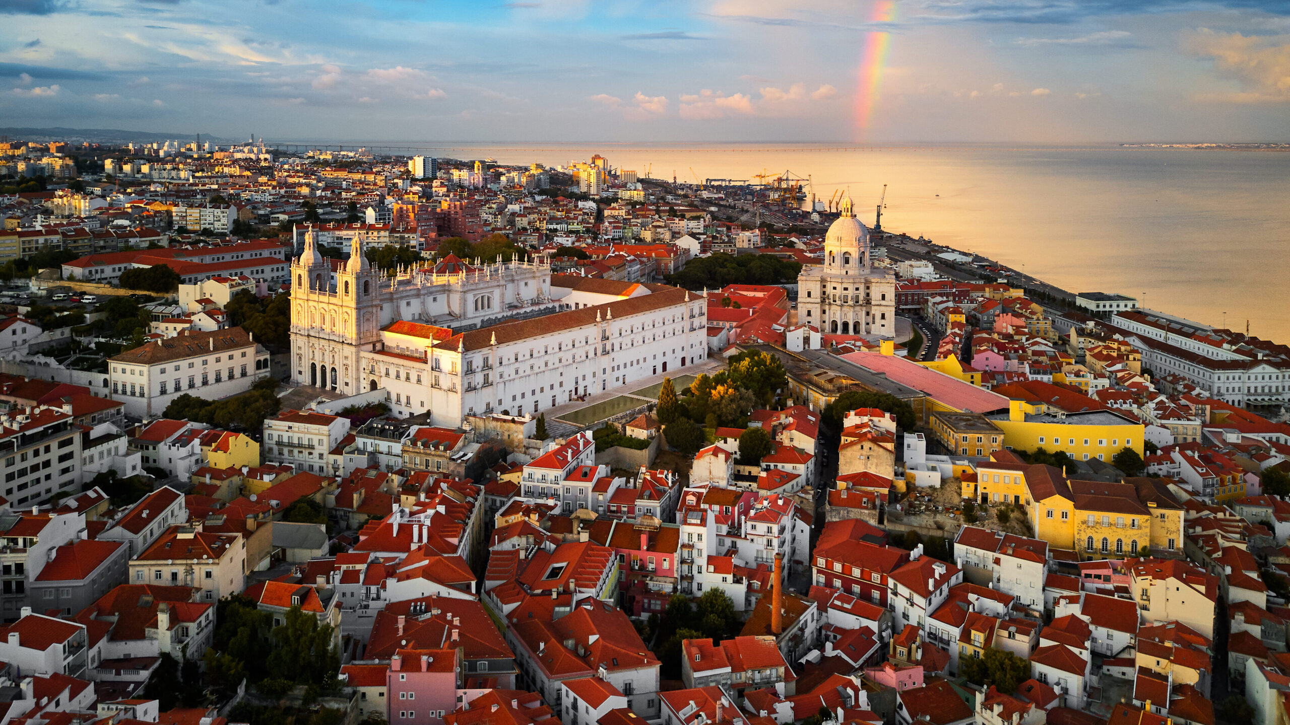 Lisbon rooftops at dusk, seen from the Alfama hillside